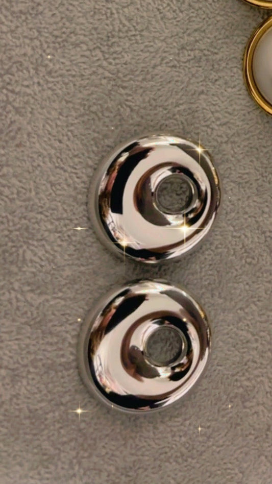 Aretes plateados Dona