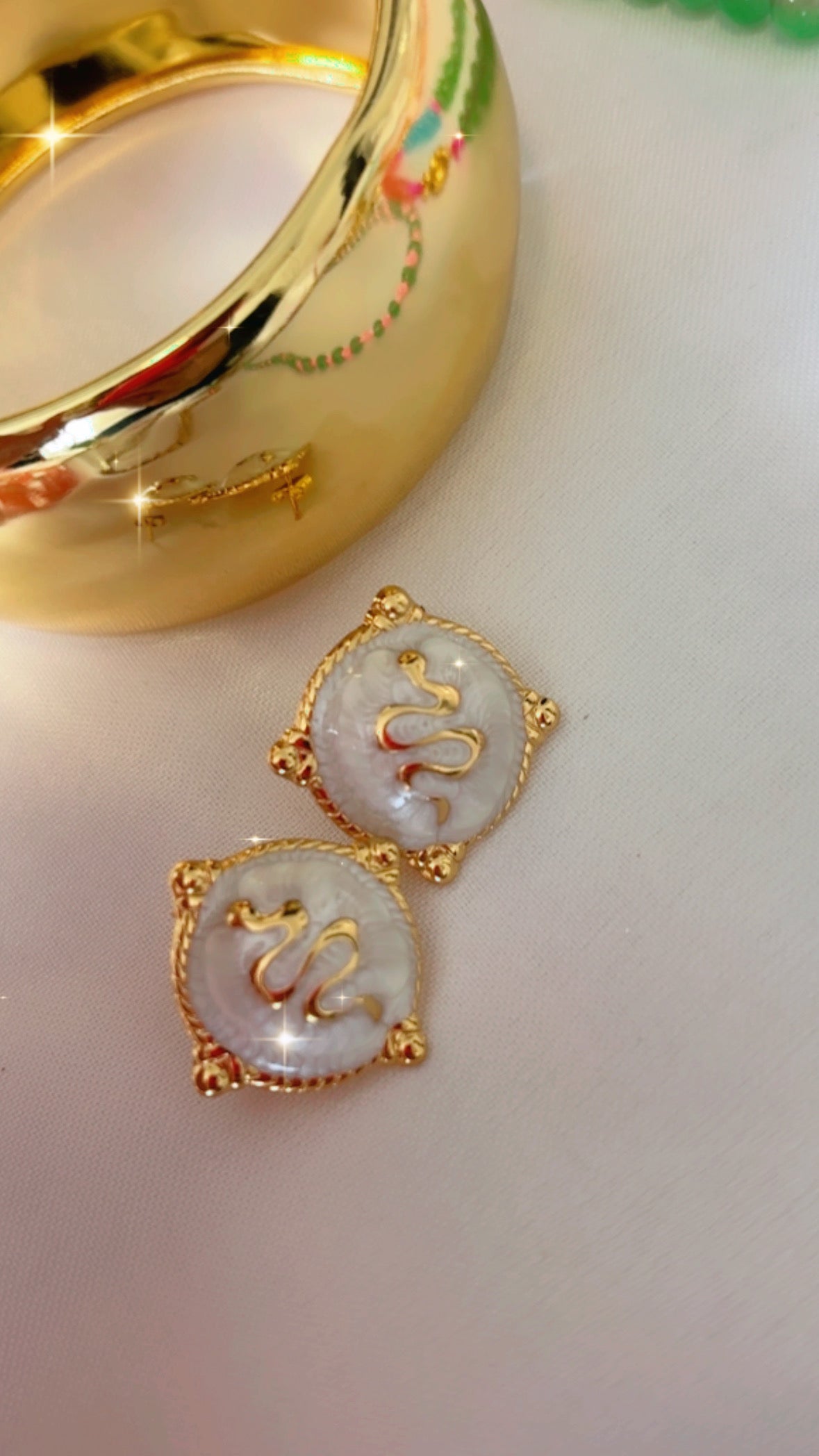 Aretes serpientes